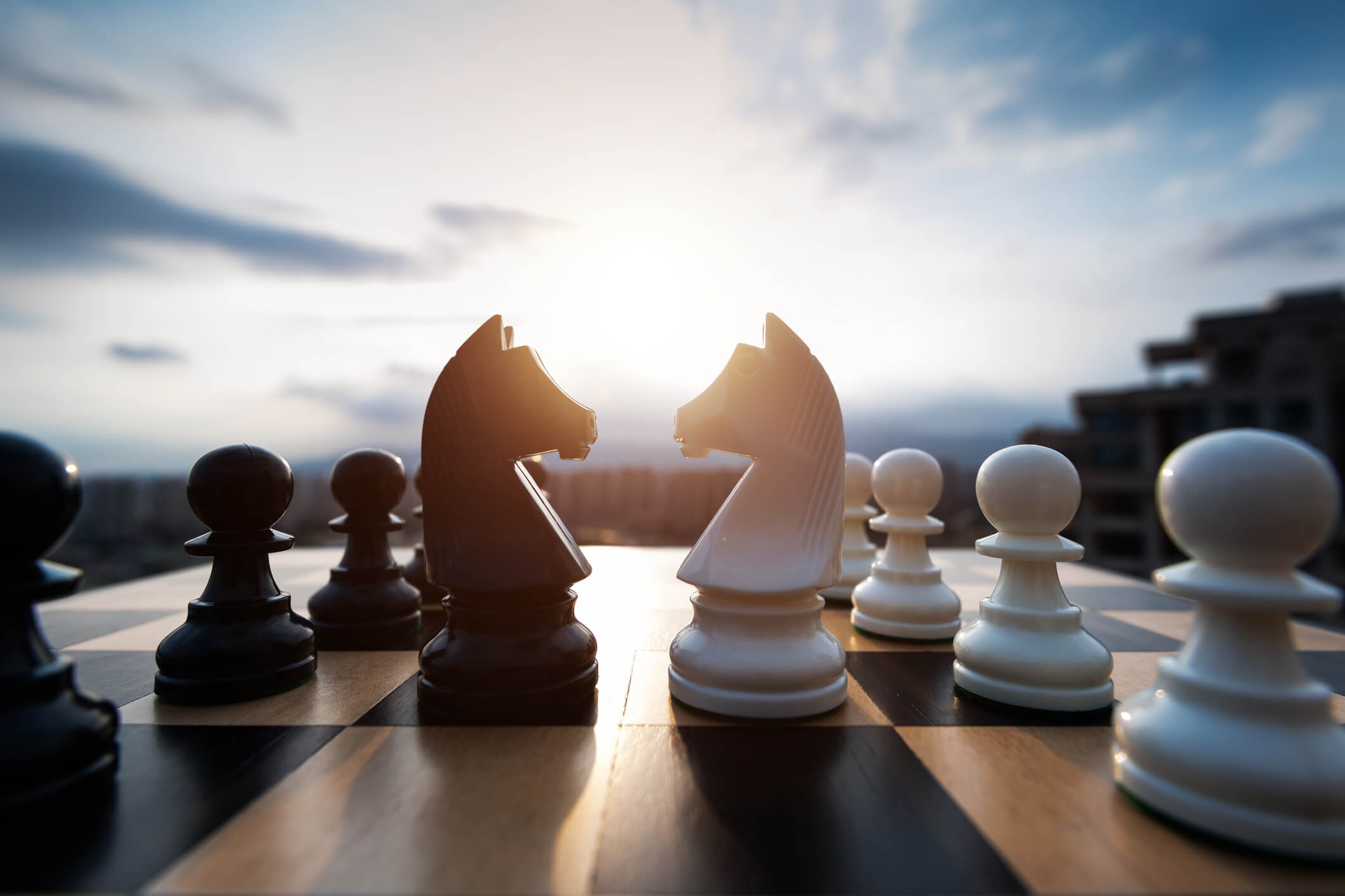 Chess-Board-Sunrise-Knights-Facing-iStock-2148026117.jpg