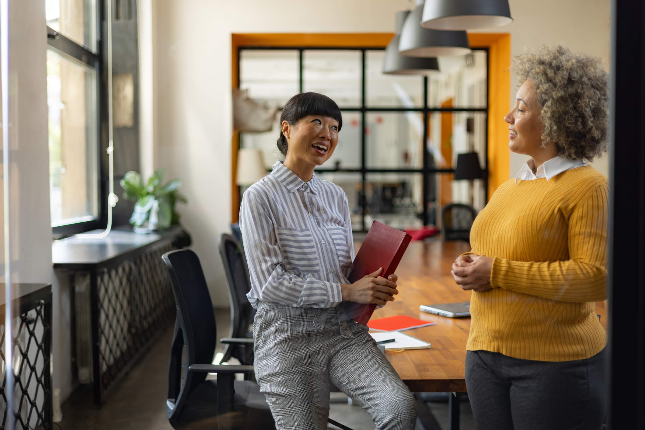 Corporate Office Women Communicating